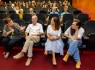 Vereadora Sara Coelho, oradores e público à conversa sobre Migrações